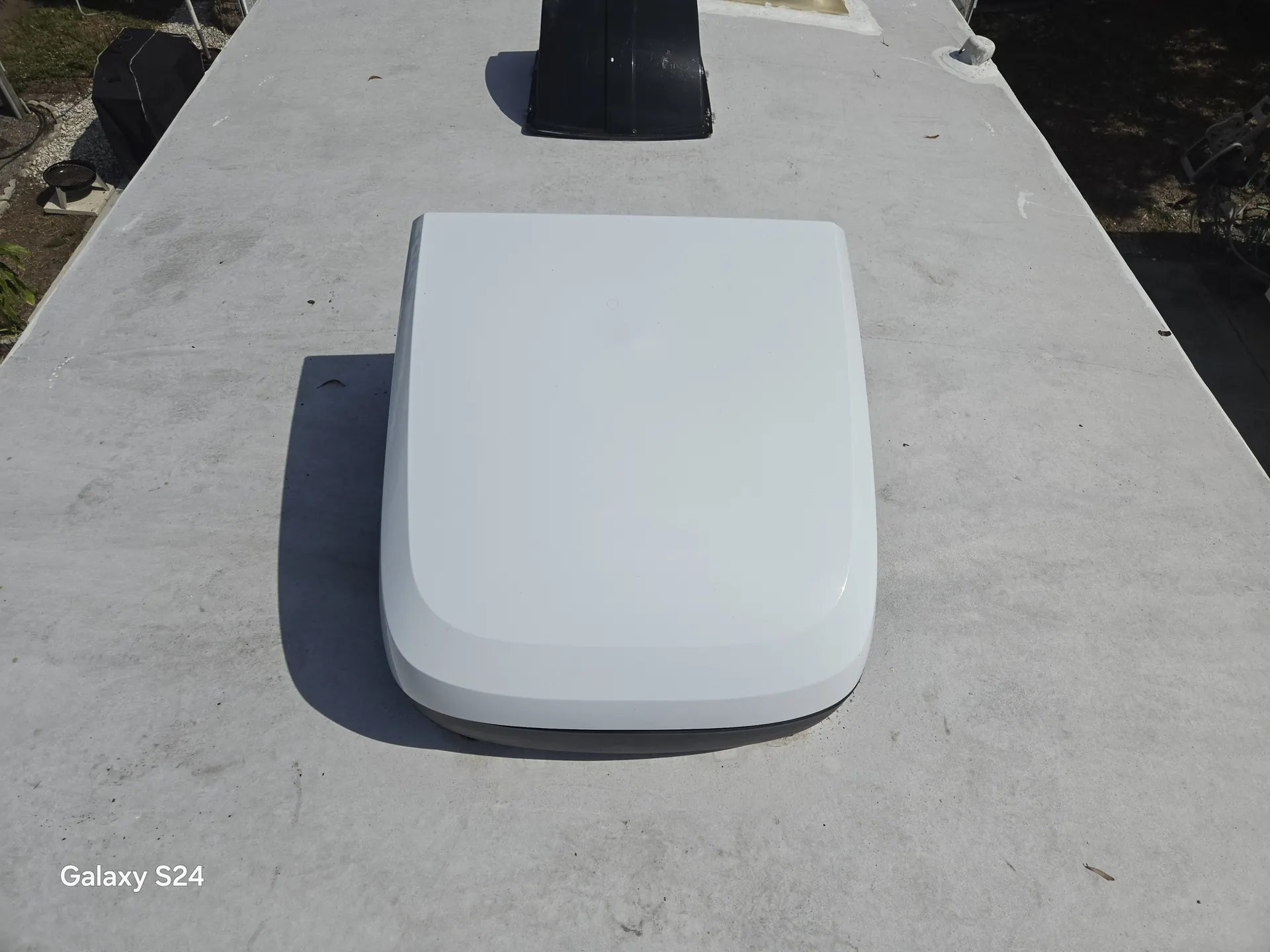 New white RV rooftop air conditioner shroud installed in Nokomis, Florida
