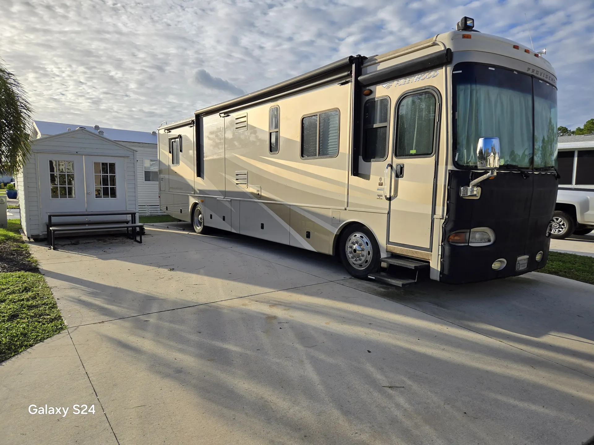 Fleetwood Providence Class A diesel motorhome serviced on site at an RV resort in Sarasota, FL