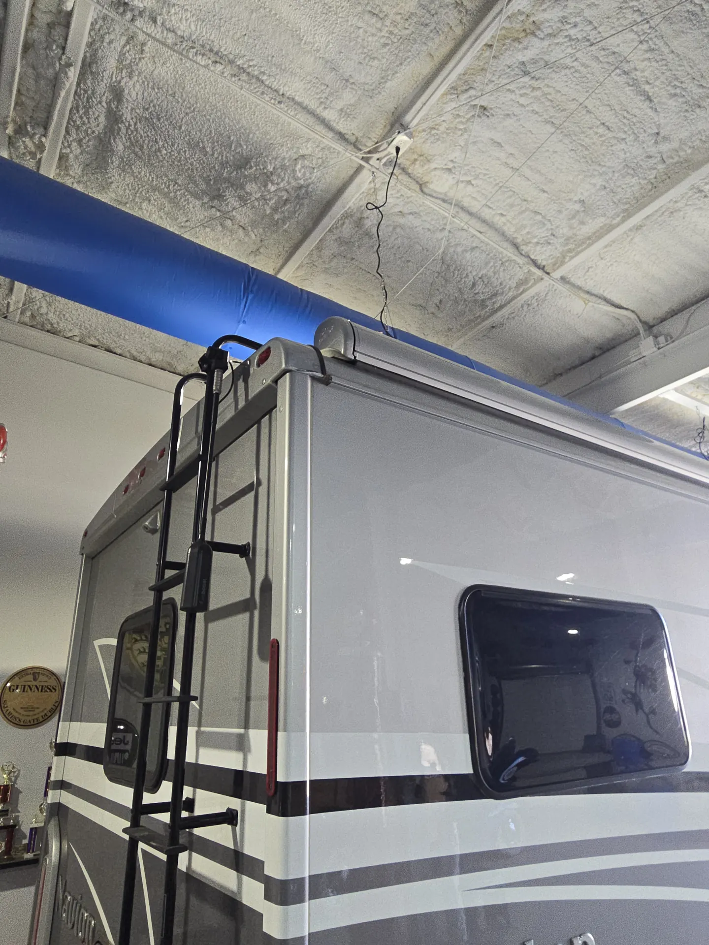 Motorhome awning rail and roof edge repaired in Sarasota, Florida