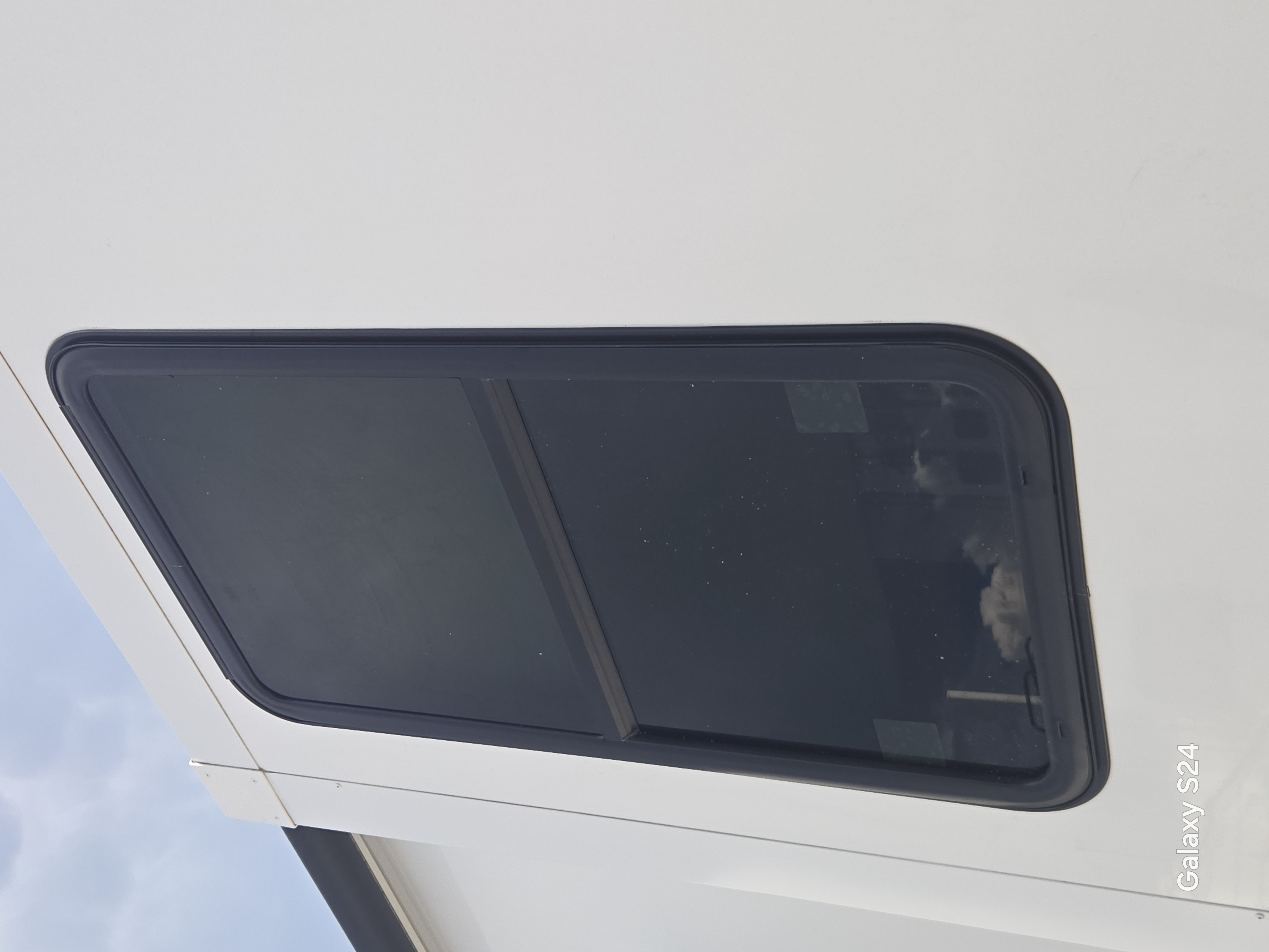 RV window being replaced during a mobile repair visit in Sarasota, FL